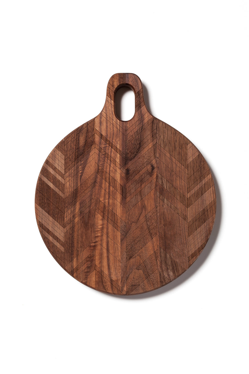 Round Hardwood Cutting Board with herringbone pattern